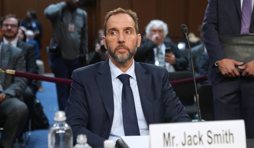 Former Justice Department special counsel Jack Smith is seated before he testifies before the Senate Judiciary Committee at the U.S. Capitol on Tuesday, Sept. 29, 2026, in Washington. (AP Photo/Allison Robbert)