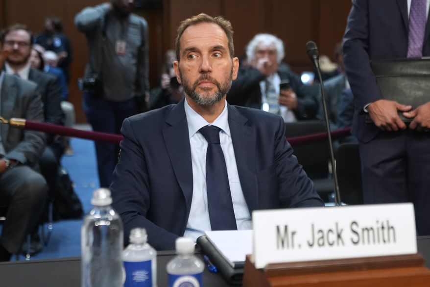 Former Justice Department special counsel Jack Smith is seated before he testifies before the Senate Judiciary Committee at the U.S. Capitol on Tuesday, Sept. 29, 2026, in Washington. (AP Photo/Allison Robbert)