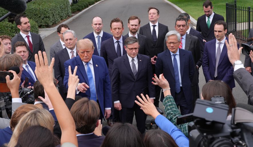 President Donald Trump speaks to reporters at the White House in Washington, Tuesday Sept. 29, 2026, after meeting with top executives of AI firms, as House Speaker Mike Johnson of La., and NVIDIA CEO Jensen Huang listen. (AP Photo/Jacquelyn Martin)