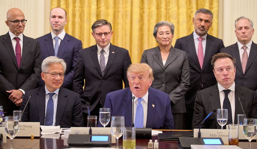 President Donald Trump, center, next to Nvidia CEO Jensen Huang, left, and Elon Musk, right, speaks in the East Room of the White House in Washington, Tuesday Sept. 29, 2026, surrounded by top executives of AI firms including, from top left, Microsoft CEO Satya Nadella, Greg Brockman, President of OpenAI, House Speaker Mike Johnson, AMD CEO Lisa Su, Palo Alto Networks Chief Executive Nikesh Arora, and David Sacks. (AP Photo/Jacquelyn Martin)