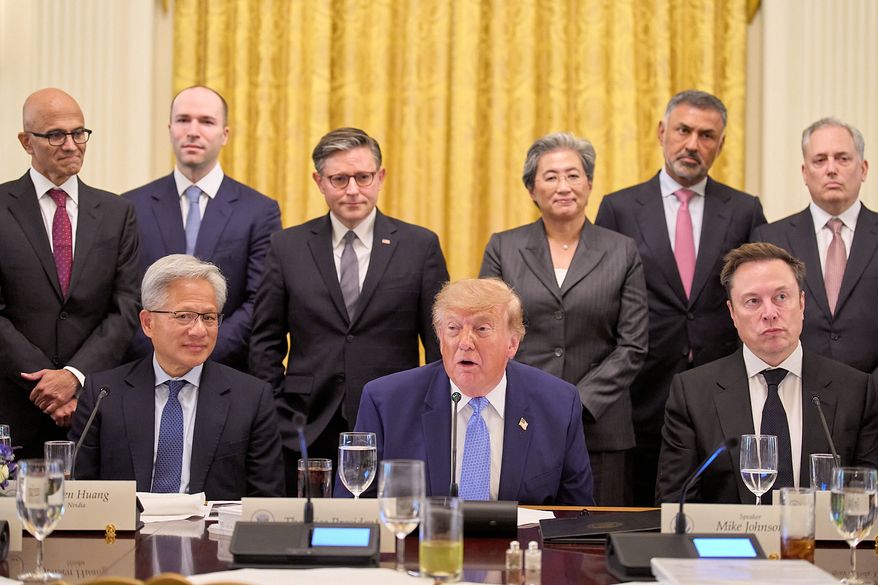 President Donald Trump, center, next to Nvidia CEO Jensen Huang, left, and Elon Musk, right, speaks in the East Room of the White House in Washington, Tuesday Sept. 29, 2026, surrounded by top executives of AI firms including, from top left, Microsoft CEO Satya Nadella, Greg Brockman, President of OpenAI, House Speaker Mike Johnson, AMD CEO Lisa Su, Palo Alto Networks Chief Executive Nikesh Arora, and David Sacks. (AP Photo/Jacquelyn Martin)