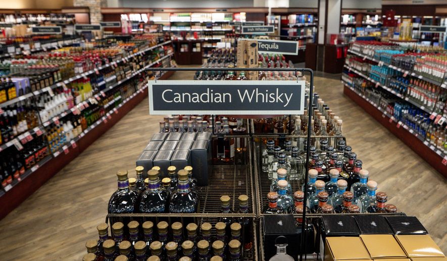 Canadian whisky is pictured at a British Columbia Liquor store in Vancouver on Aug. 25, 2026. (Ethan Cairns/The Canadian Press via AP, File)