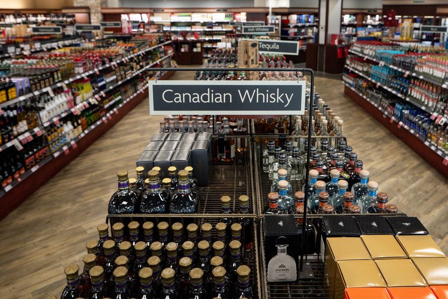 Canadian whisky is pictured at a British Columbia Liquor store in Vancouver on Aug. 25, 2026. (Ethan Cairns/The Canadian Press via AP, File)