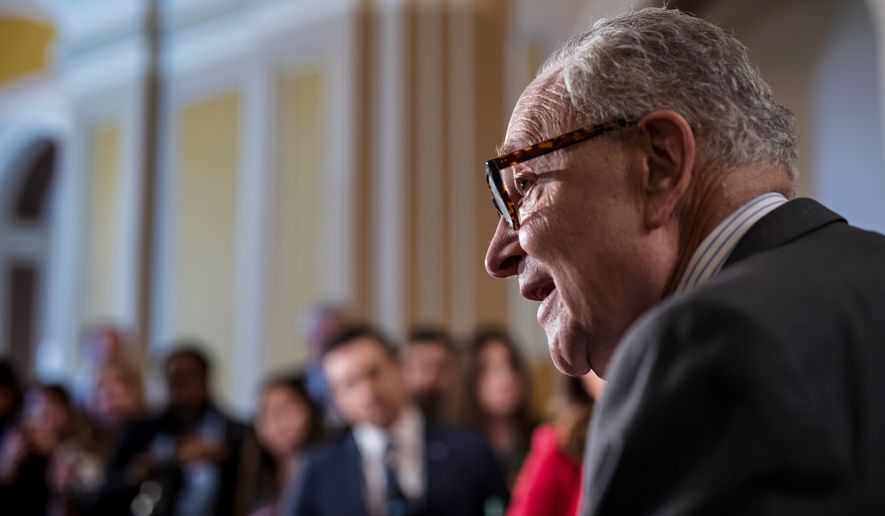 Senate Minority Leader Chuck Schumer, D-N.Y., meets with reporters after a closed-door meeting with fellow Democrats, at the Capitol in Washington, Tuesday, Sept. 29, 2026. (AP Photo/J. Scott Applewhite)
