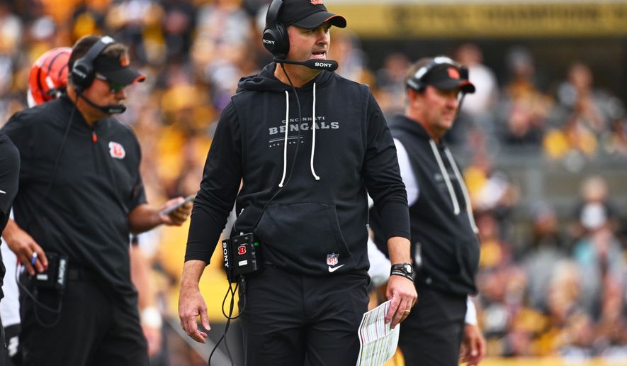 Cincinnati Bengals head coach Zac Taylor calls out from the sideline during the second half of an NFL football game against the Pittsburgh Steelers in Pittsburgh, Sunday, Sept. 27, 2026. (AP Photo/Justin Berl)