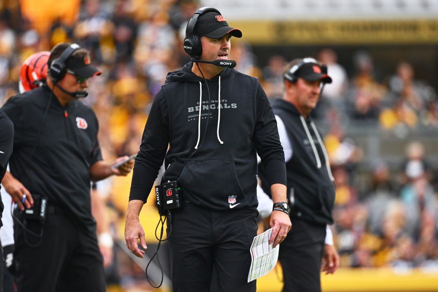 Cincinnati Bengals head coach Zac Taylor calls out from the sideline during the second half of an NFL football game against the Pittsburgh Steelers in Pittsburgh, Sunday, Sept. 27, 2026. (AP Photo/Justin Berl)