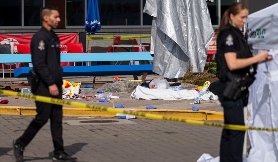 Emergency personnel respond after a vehicle drove through a Truth and Reconciliation event at the Tsawwassen Mills Mall in Tsawwassen, British Columbia, Canada, Wednesday, Sept. 30, 2026. (Rich Lam/The Canadian Press via AP)