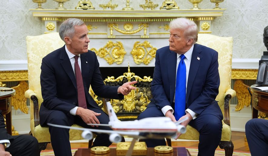 FILE - Canadian Prime Minister Mark Carney speaks during a meeting with President Donald Trump at the White House, Oct. 7, 2025, in Washington. (AP Photo/Evan Vucci, File)