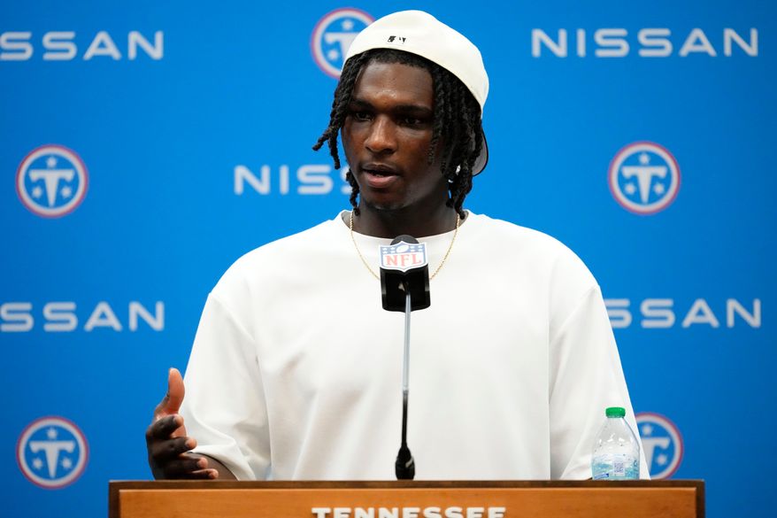 Tennessee Titans quarterback Cam Ward speaks during a news conference after an NFL football game against the Philadelphia Eagles, Sunday, Sept. 20, 2026, in Nashville, Tenn.(AP Photo/George Walker IV)