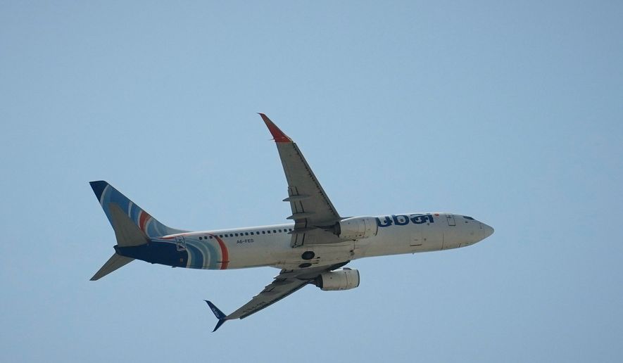 A FlyDubai aircraft takes off from Dubai International Airport in Dubai, United Arab Emirates, Wednesday, Sept. 30, 2026. (AP Photo)