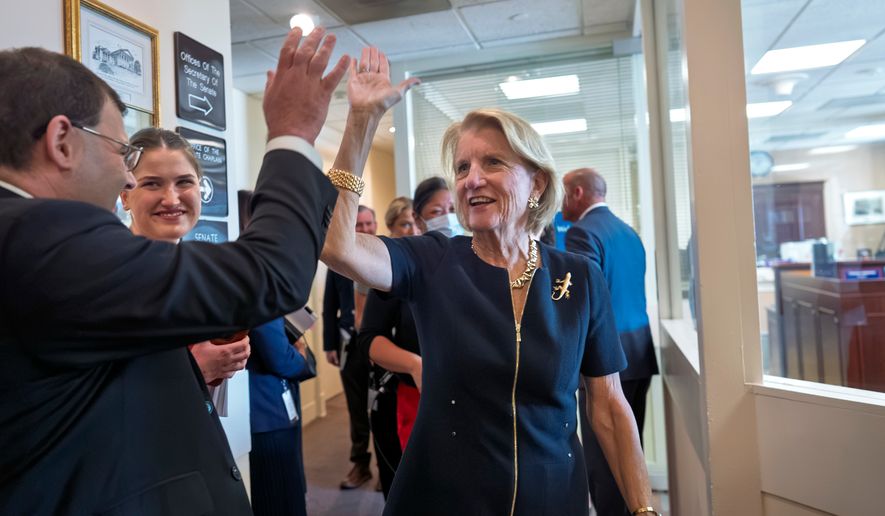 Sen. Shelly Moore Capito, R-W.Va., chair of the Environment and Public Works Committee, thanks members of her staff after announcing a bipartisan bill to reform the federal environmental review and permitting process, at the Capitol in Washington, Wednesday, Sept. 30, 2026. (AP Photo/J. Scott Applewhite)
