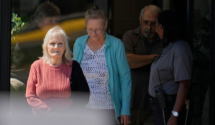 May Martinez, left, mother of murder victim Colleen Slemmer, walks out of Riverbend Maximum Security Institution during a stay of the planned execution of Christa Pike, Wednesday, Sept. 30, 2026, in Nashville, Tenn. (AP Photo/George Walker IV)