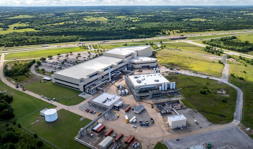 A Coherent manufacturing facility in Sherman, Texas, Tuesday, June 16, 2026. (AP Photo/Jeffrey McWhorter, File)