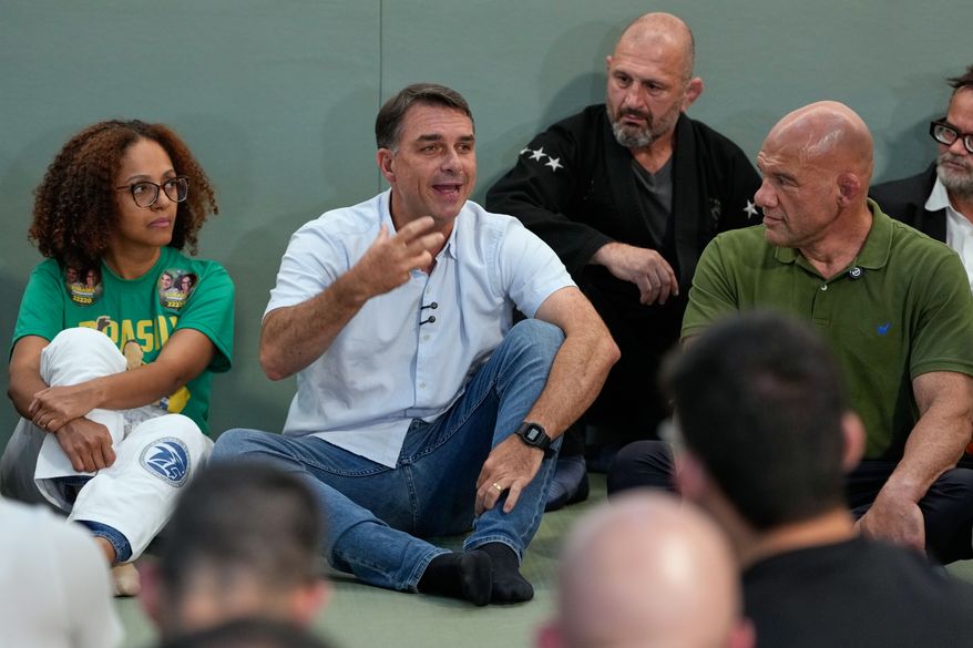 Opposition presidential candidate Sen. Flavio Bolsonaro meets with jiu-jitsu black belts as part of his campaign ahead of general elections in Sao Paulo, Tuesday, Sept. 29, 2026. (AP Photo/Andre Penner)