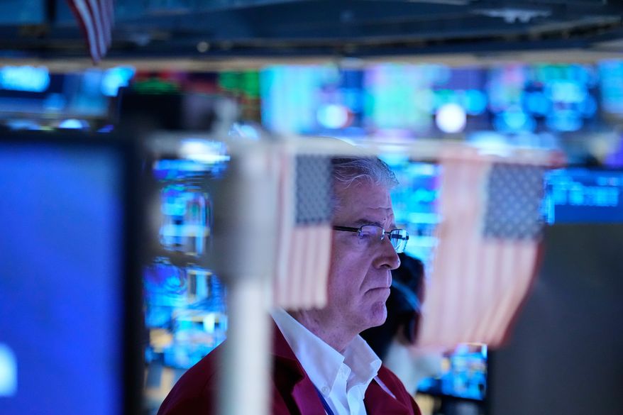 Daniel Kryger works on the floor at the New York Stock Exchange in New York, Monday, Sept. 14, 2026. (AP Photo/Seth Wenig)