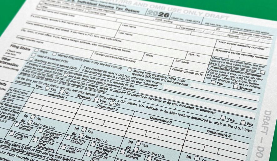 A draft version of the IRS 1040 tax form for 2026 is photographed Wednesday, Sept. 30, 2026. (AP Photo/Jon Elswick)