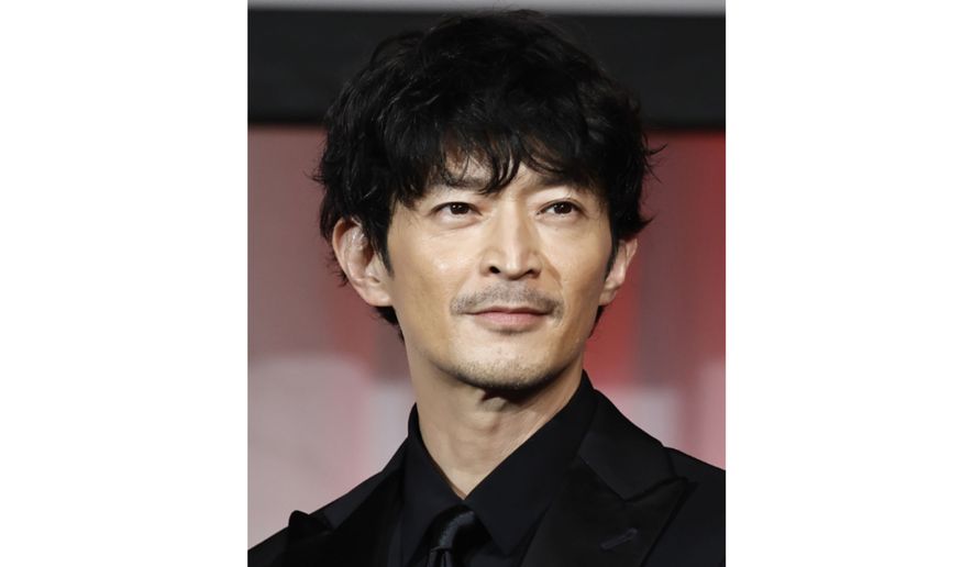 Kenjiro Tsuda, a Japanese actor is seen on a stage, November, 2024, in Tokyo, Japan. (Kyodo News via AP)