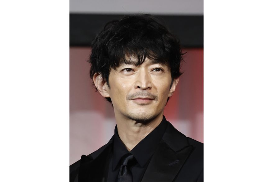 Kenjiro Tsuda, a Japanese actor is seen on a stage, November, 2024, in Tokyo, Japan. (Kyodo News via AP)