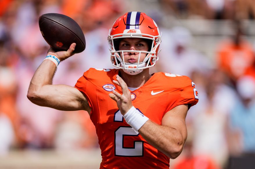 Clemson quarterback Tait Reynolds passes the ball in the first half of an NCAA college football game against North Carolina Saturday, Sept. 19, 2026, in Clemson, S.C. (AP Photo/Jacob Kupferman)