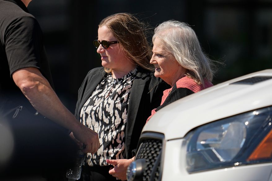 May Martinez, left, mother of murder victim Colleen Slemmer, walks out of Riverbend Maximum Security Institution during a stay of the planned execution of Christa Pike, Wednesday, Sept. 30, 2026, in Nashville, Tenn. (AP Photo/George Walker IV)