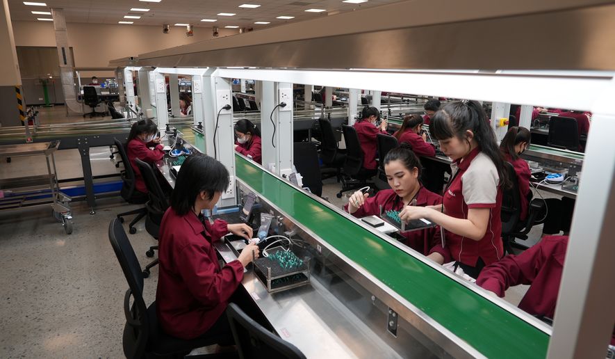 Craftspersons create jewelry pieces at the Pandora factory in Ho Chi Minh city, Vietnam, Wednesday, Sept.30, 2026. (AP Photo/Hau Dinh)