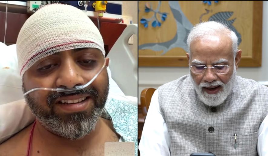 This screengrab from Narendra Modi YouTube Channel shows Indian Prime Minister Narendra Modi speaking with FlyDubai pilot Capt. Smit Machchhar on Friday, Oct. 2, 2026. (Narendra Modi YouTube Channel via AP )