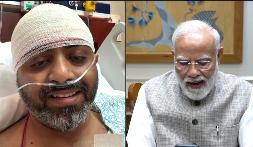 This screengrab from Narendra Modi YouTube Channel shows Indian Prime Minister Narendra Modi speaking with FlyDubai pilot Capt. Smit Machchhar on Friday, Oct. 2, 2026. (Narendra Modi YouTube Channel via AP )
