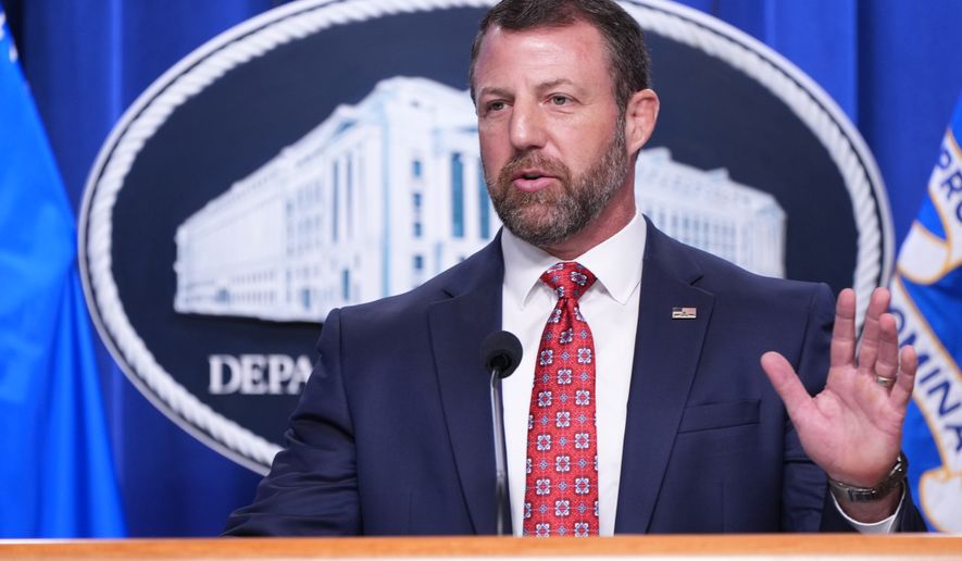 Secretary of Homeland Security Markwayne Mullin, speaks during a news conference at the Department of Justice, Wednesday Sept. 30, 2026, in Washington. (AP Photo/Jacquelyn Martin)