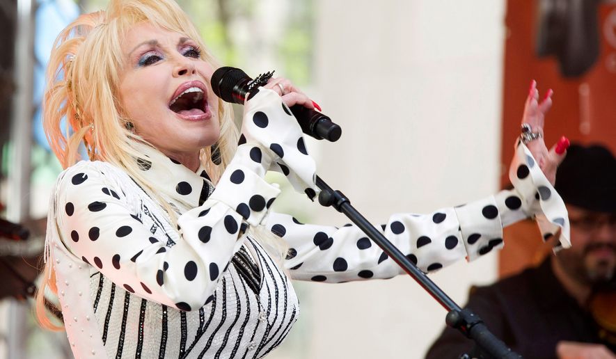 Dolly Parton performs on NBC's "Today" show in New York on May 13, 2014. (Photo by Charles Sykes/Invision/AP, File)