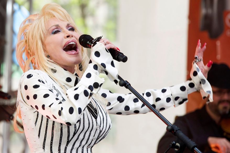 Dolly Parton performs on NBC's "Today" show in New York on May 13, 2014. (Photo by Charles Sykes/Invision/AP, File)