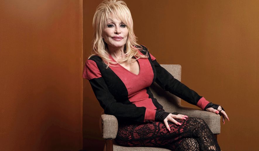 Dolly Parton poses at the Carnegie Medal of Philanthropy Ceremony in New York, on Oct. 13, 2022. (AP Photo/Andres Kudacki, File)