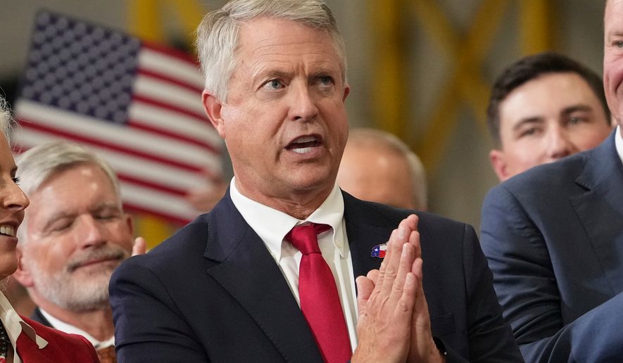 Sen. Roger Marshall, R-Kan., gestures as Vice President JD Vance speaks in Olathe, Kan., on Sept. 14, 2026. (AP Photo/Mark Schiefelbein, Pool) **FILE**
