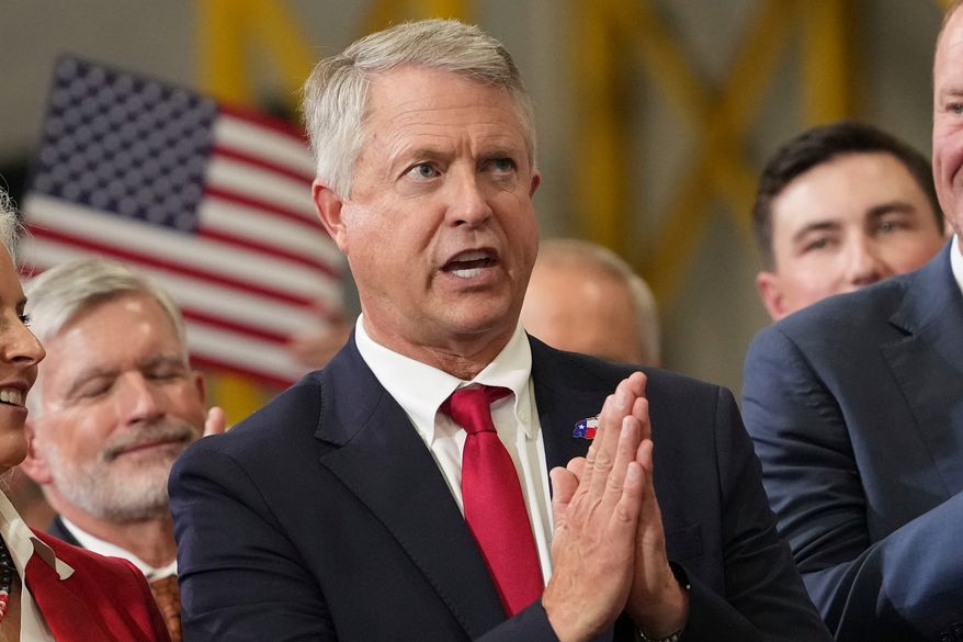Sen. Roger Marshall, R-Kan., gestures as Vice President JD Vance speaks in Olathe, Kan., on Sept. 14, 2026. (AP Photo/Mark Schiefelbein, Pool) **FILE**