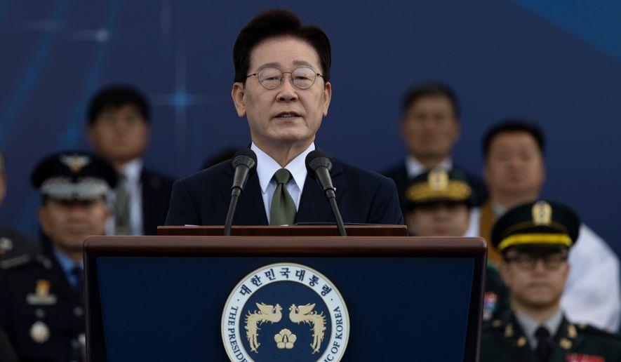 South Korean President Lee Jae Myung delivers a speech during the Armed Forces Day at a military base in Gyeyong, South Korea, Thursday, Oct. 1, 2026. (Jeon Heon-kyun/Pool Photo via AP)