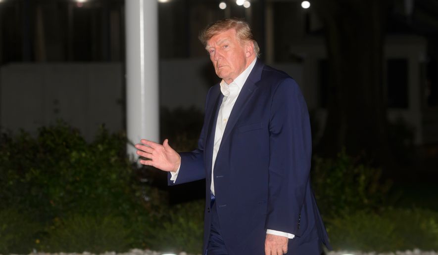 President Donald Trump arrives on Marine One on the South Lawn of the White House, Friday, Oct. 2, 2026, in Washington. (AP Photo/Rod Lamkey, Jr.)