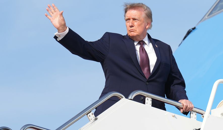 President Donald Trump boards Air Force One at Joint Base Andrews, Md., Friday, Oct. 2, 2026, en route to Alabama. (AP Photo/Jacquelyn Martin)