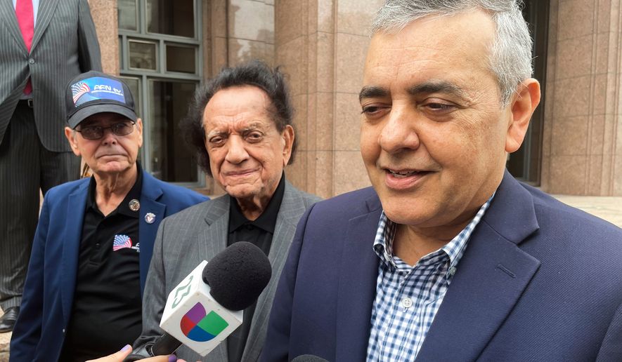 Former U.S. Rep. David Rivera speaks with media outside a federal court in Miami, Dec. 20, 2022. (AP Photo/Joshua Goodman, File)