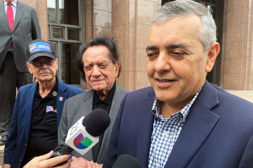 Former U.S. Rep. David Rivera speaks with media outside a federal court in Miami, Dec. 20, 2022. (AP Photo/Joshua Goodman, File)