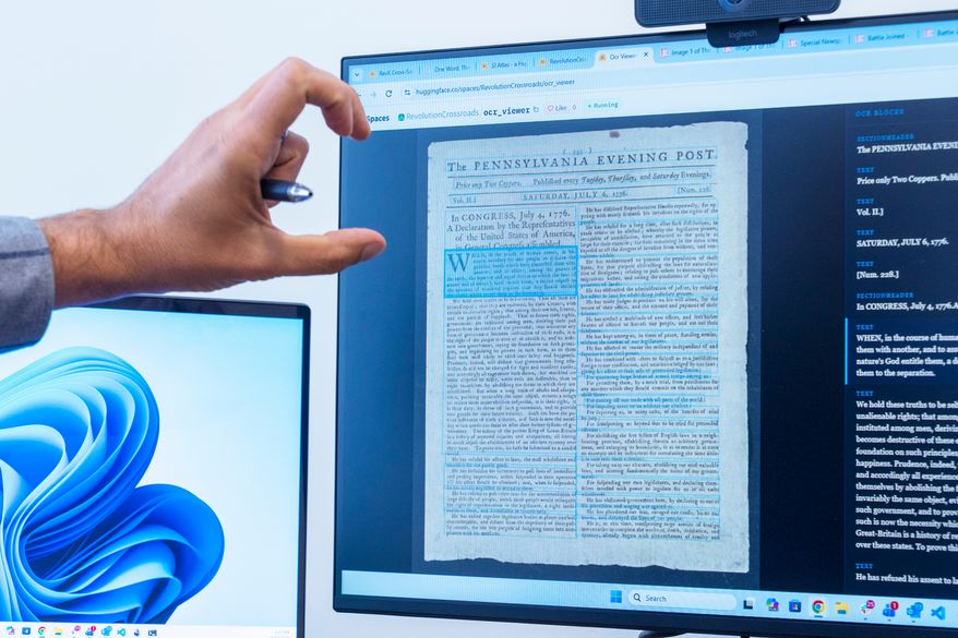Smithsonian data scientist Mike Trizna, shows a copy on a computer screen of the first printed publication of the Declaration of Independence, Tuesday, Sept. 29, 2026, in Washington. (AP Photo/Manuel Balce Ceneta)