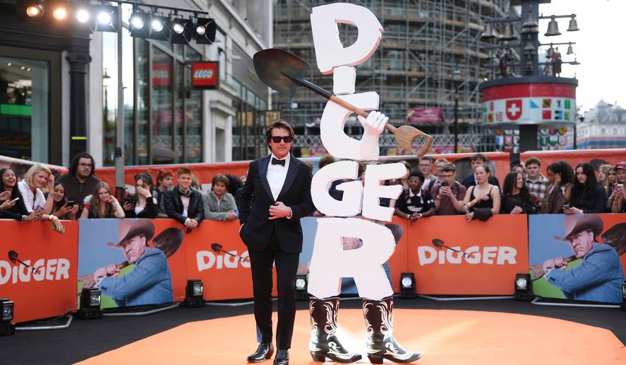 Tom Cruise poses for photographers upon arrival at the World premiere for the film "Digger" in London, Tuesday, Sept. 22, 2026. (Photo by Scott A Garfitt/Invision/AP)