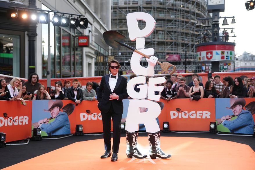 Tom Cruise poses for photographers upon arrival at the World premiere for the film "Digger" in London, Tuesday, Sept. 22, 2026. (Photo by Scott A Garfitt/Invision/AP)