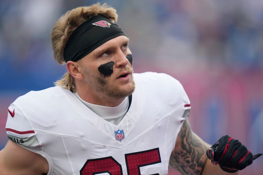 Arizona Cardinals tight end Trey McBride pauses on the field during an NFL football game against the New York Giants, in East Rutherford, N.J., Sunday, Oct. 4, 2026. (AP Photo/Seth Wenig)