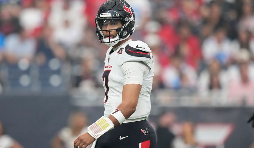 Houston Texans quarterback C.J. Stroud looks to the sideline during the first half of an NFL football game against the Dallas Cowboys in Houston, Sunday, Oct. 4, 2026. (AP Photo/Ashley Landis)