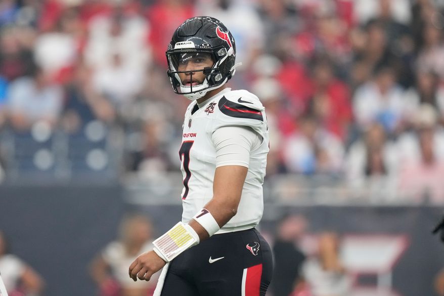 Houston Texans quarterback C.J. Stroud looks to the sideline during the first half of an NFL football game against the Dallas Cowboys in Houston, Sunday, Oct. 4, 2026. (AP Photo/Ashley Landis)