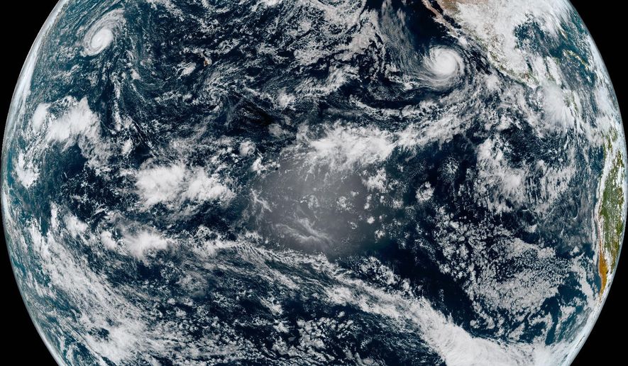 This satellite image from the National Oceanic and Atmospheric Administration shows Hurricane Nolo in the Pacific Ocean, top left, and Hurricane Rachel off Mexico, top right, Sunday, Oct. 4, 2026, at 4:50 p.m. Eastern time. (National Oceanic and Atmospheric Administration via AP)