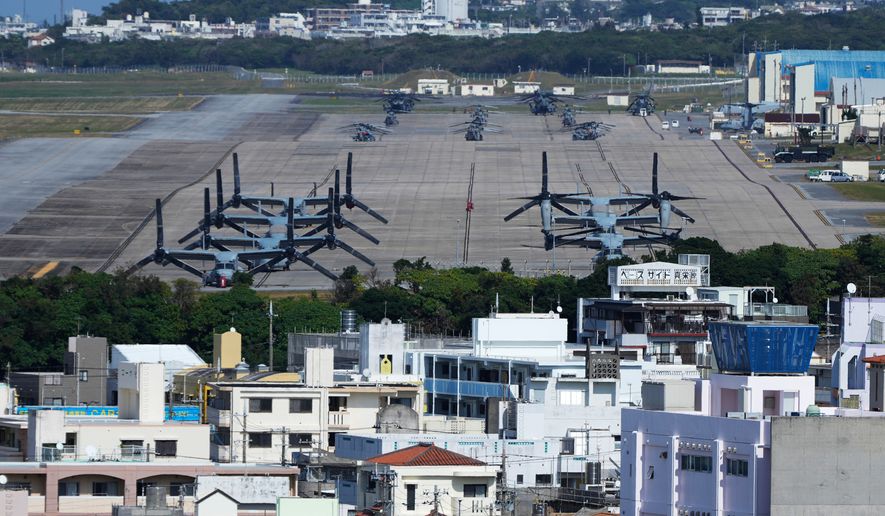 U.S. MV-22 Osprey transport aircraft are parked at the U.S. Marine Corps Air Station Futenma in Ginowan, on the main island of the Okinawa archipelago, southern Japan, Tuesday, Feb. 18, 2025. (AP Photo/Hiro Komae, File)