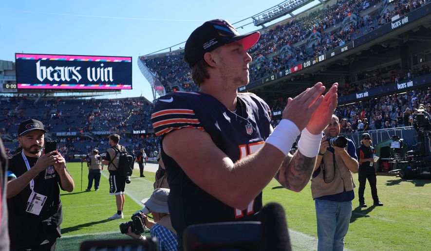 Chicago Bears quarterback Tyson Bagent celebrates a victory over the New York Jets as he walks off the field following an NFL football game Sunday, Oct. 4, 2026, in Chicago. (AP Photo/Nam Y. Huh)