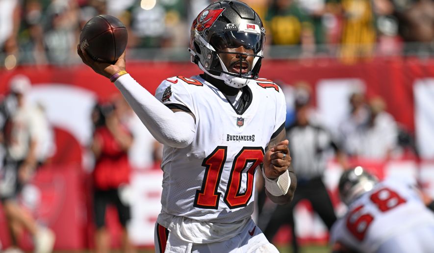 Tampa Bay Buccaneers quarterback Jalon Daniels (10) aims a pass during the second half of an NFL football game against the Green Bay Packers in Tampa, Fla., Sunday, Oct. 4, 2026. (AP Photo/Jason Behnken)