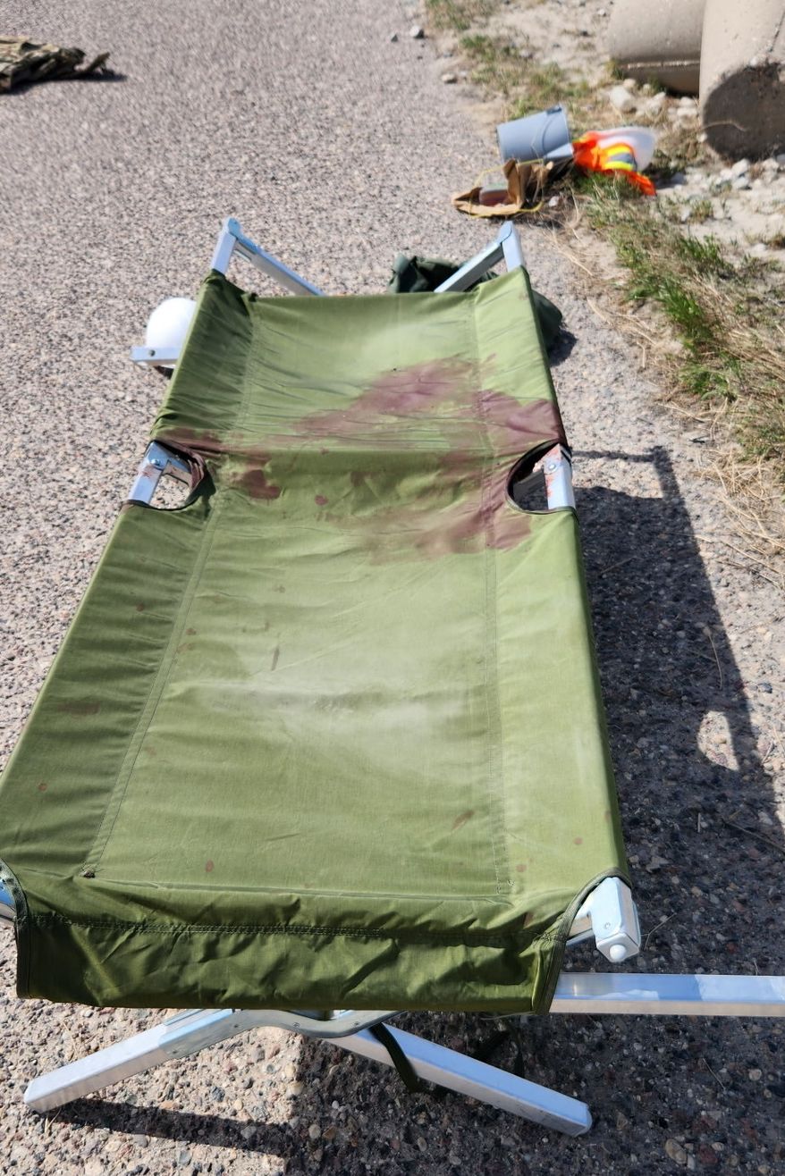 In this photo obtained by The Associated Press, blood stains a stretcher at Port Shuaiba in Kuwait on March 1, 2026, after an Iranian drone strike killed multiple U.S. soldiers and injured dozens more. (AP Photo)