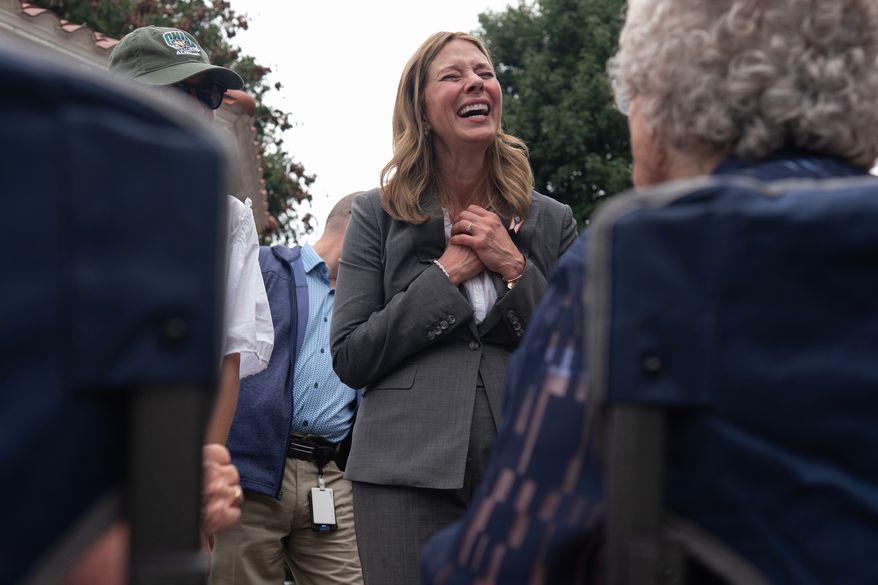 Democratic gubernatorial candidate Dr. Amy Acton visits with supporters during a campaign event along the Ohio River, in Marietta, Ohio, Thursday, Sept. 17, 2026. (AP Photo/Carolyn Kaster)